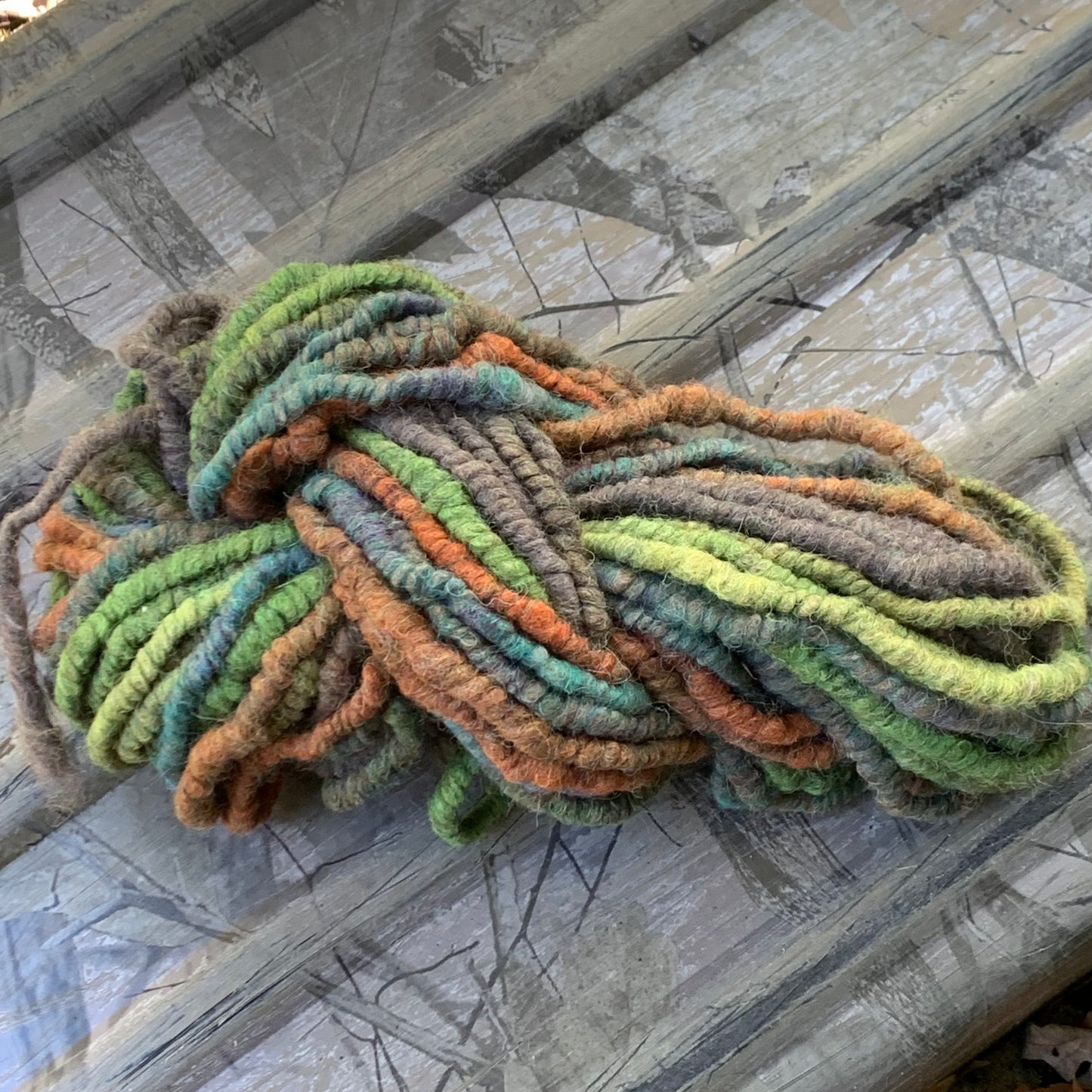 Autumn Leaves Corespun Alpaca Yarn #4 on sled